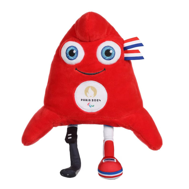 Das Maskottchen Phryge der Olympischen Spiele ist eine rote M&uuml;tze mit Augen. Das rechte Bein ist eine Beinprothese. 